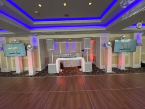 Modern futuristic DJ booth with glowing lights.