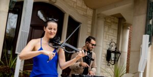 Violinist and DJ Duo Performing Live Music for Wedding Ceremony