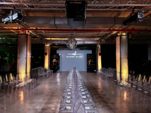 Elegant event space with a blend of lighting, decor, and layout demonstrating superior event design.