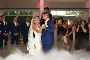 Elegant first dance wedding setup with Dancing on the Clouds effect.