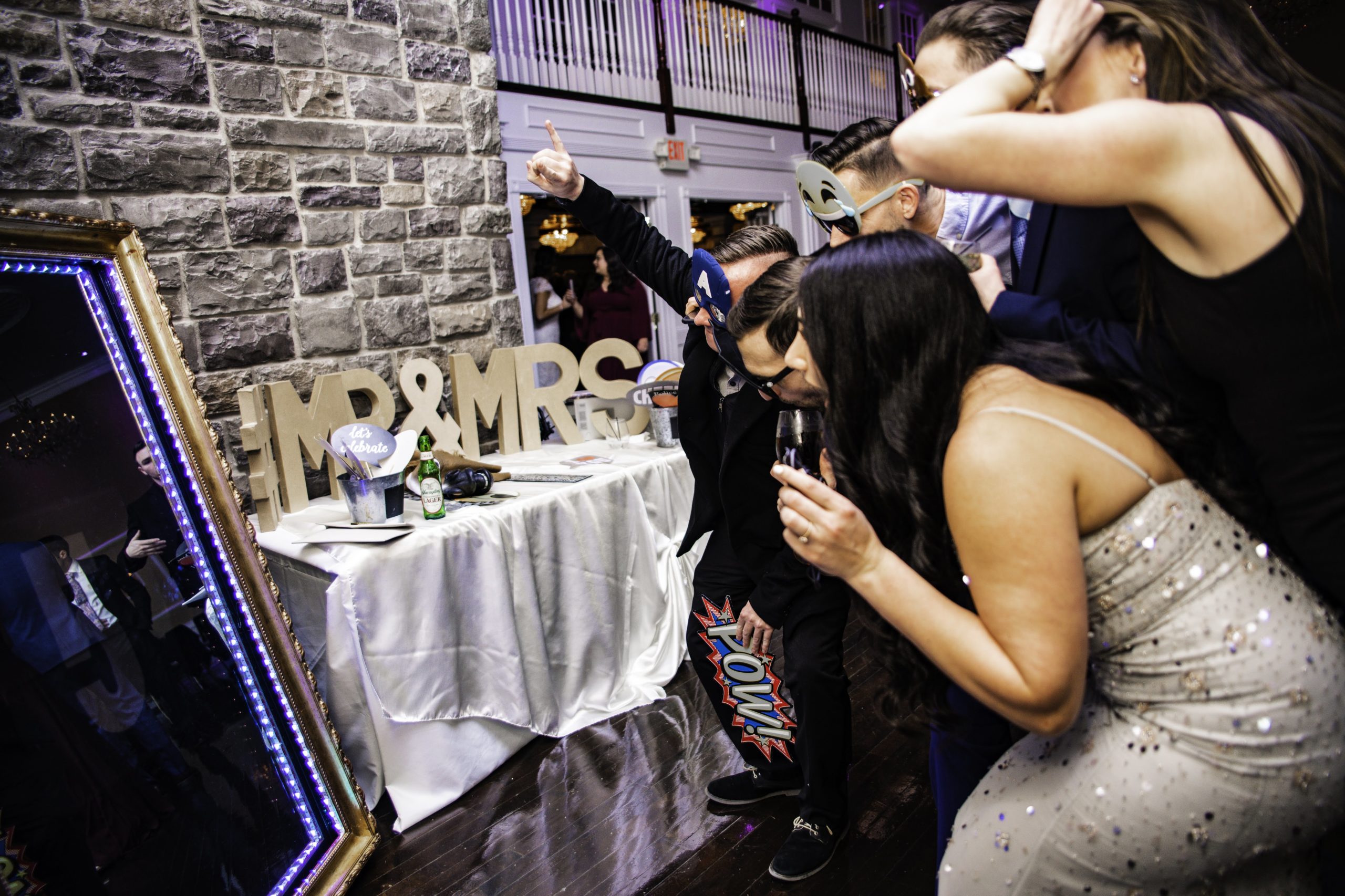 Group of people enjoying a photobooth at an event