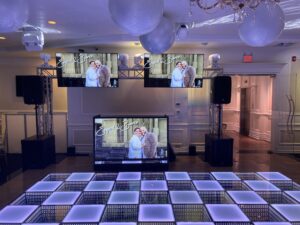 Custom dance floor with dynamic LED lights and personalized graphics