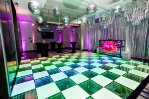 Themed LED dance floor showcasing the entire disco party production.