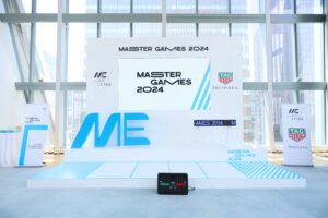 Custom stage backdrop with corporate branding at an event.
