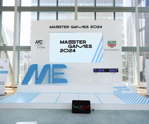 A fun corporate stage setup with branded signage for a formal business event, illustrating ideas for corporate branding at events.