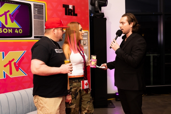 MC Jayson interviewing guests in TRL Lounge.