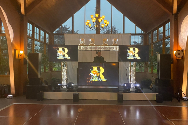 Video Wall DJ booth with vibrant screens and lighting.