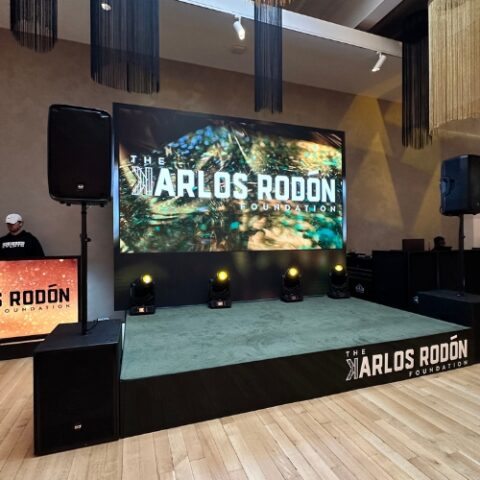 A large stage with a custom digital video wall.