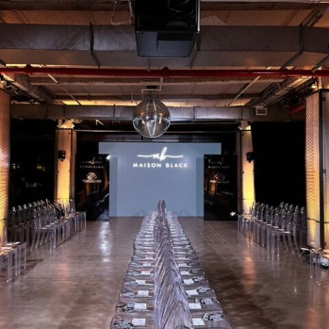 Fashion show event production with custom runway and lighting.