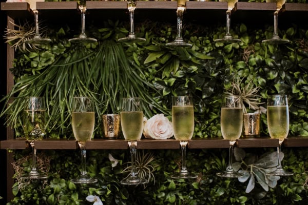 Grass champagne wall as a wedding enhancement.