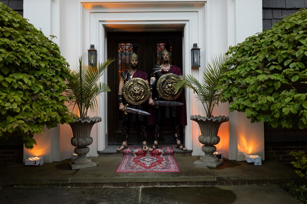 Roman guards at entrance with shields