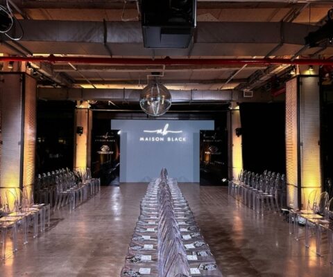 Fashion event production with lighting and runway staging