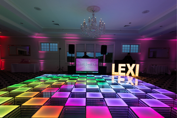 LED oversized letters next to dance floor