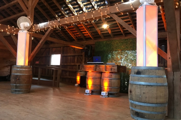 Rustic DJ booth with orange lighting