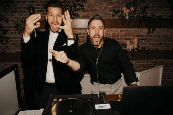 DJs bringing high energy at a wedding