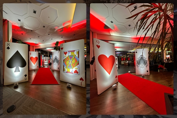 creative event flow entrance with giant playing cards