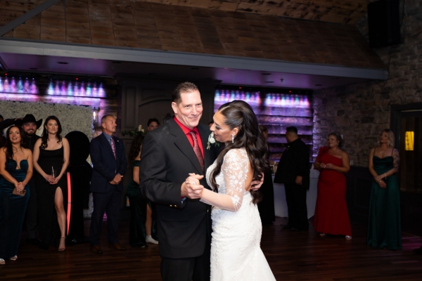 Bride dancing with her father during the father–daughter dance