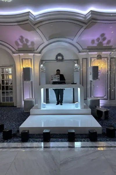 White DJ booth with staging