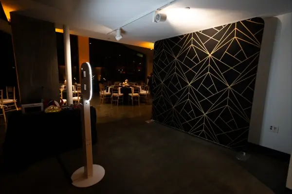 Photo booth placement near high-traffic event area