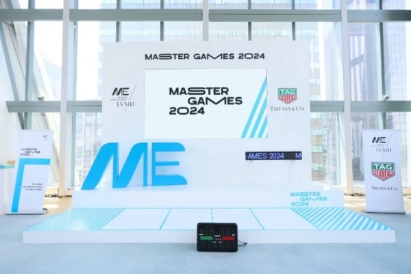 White stage fascia with Master Games branding